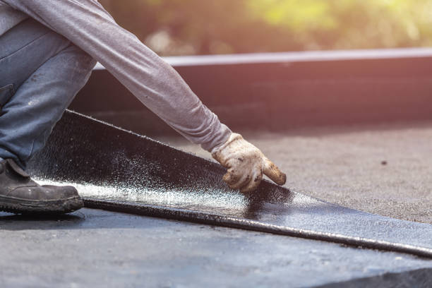Professional Waterproofing technician working in Arcadia, WI